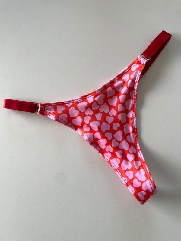 WhatsApp Image 2026-07-25 at 2.51.14 PM (1) COLALESS DE LYCRA- CORAZONES ROJOS FONDO ROSA - TALLE 2 - BS16