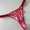 WhatsApp Image 2026-07-25 at 2.51.14 PM (2) COLALESS DE LYCRA- CORAZONES ROJOS FONDO ROSA - TALLE 2 - BS16