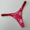 COLALESS DE LYCRA -FLORES CON FONDO ROJO- TALLE 1- BS116